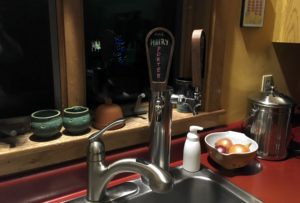 tap handle on kitchen sink with The Hairy Porter on the label